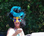 A woman in a mask at Mardi Croix.