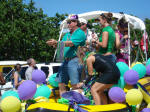 Cane Bay Dive shop float tossing out beads.