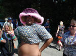 A guy with huge boobs at Mardi Croix.